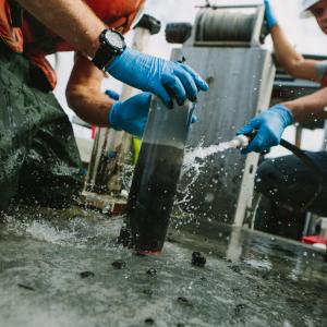 People working outside in a water treatment plant